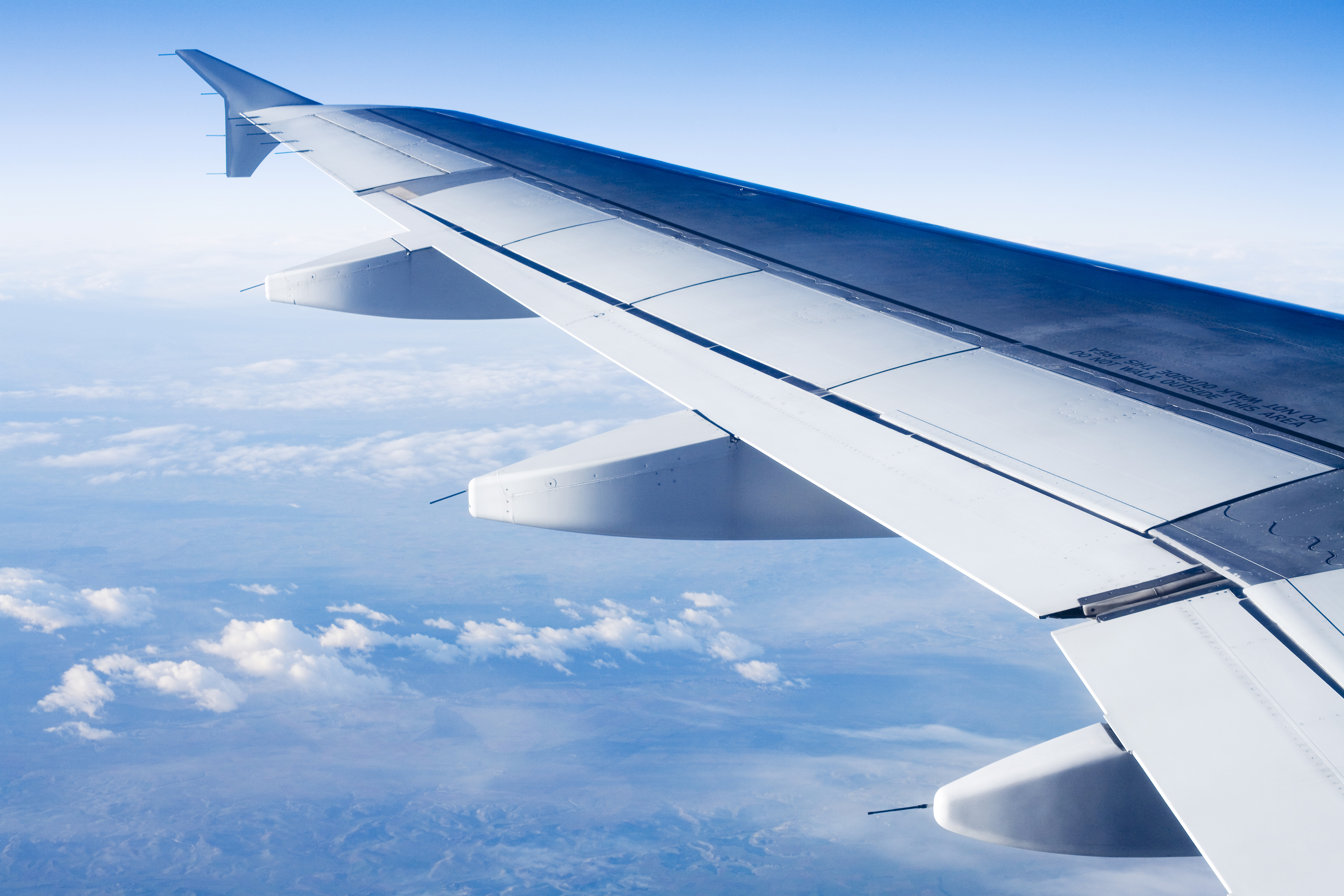 Aviation Aircraft flying in blue sky